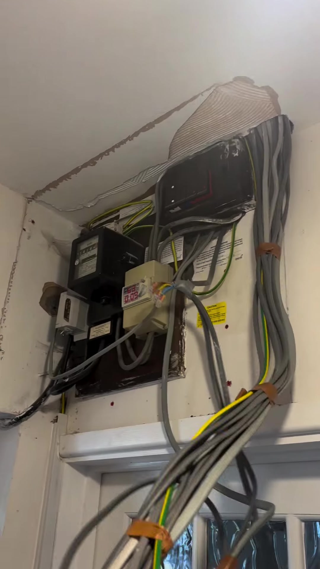 An older fuse board inspected during an EICR